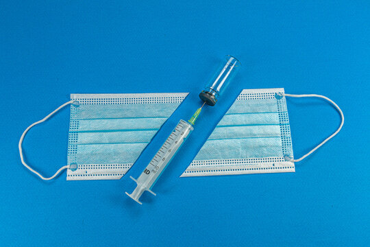 Blue background with surgical mask