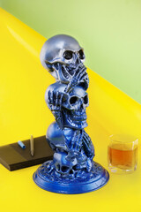 The statue of skulls no evil hear or see in grey colors