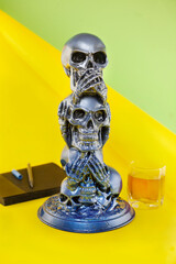 The statue of skulls no evil hear or see in grey colors