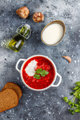 Traditional Ukrainian Russian borscht or red beetroot soup in the bowl.