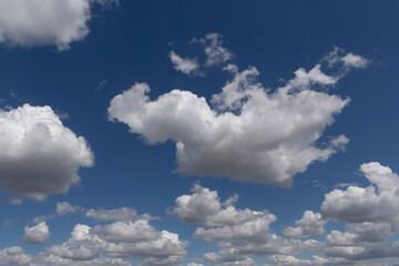 Fototapeta na wymiar view on white clouds in a blue sky