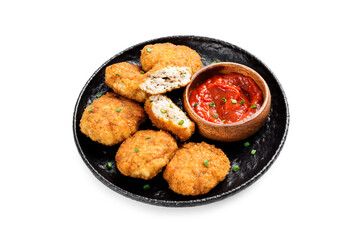 Delicious crispy fried breaded chicken patties with tomato sauce isolated on white background.