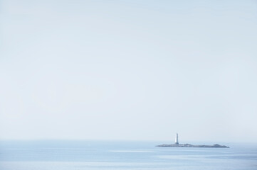 single lighthouse mindfulness empty background with ocean and blank sky