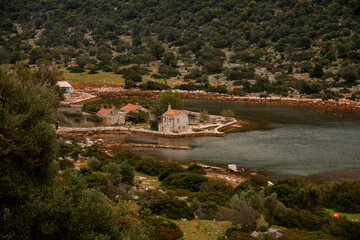 Fototapeta na wymiar great view from the hill to the bay and the island with stone houses
