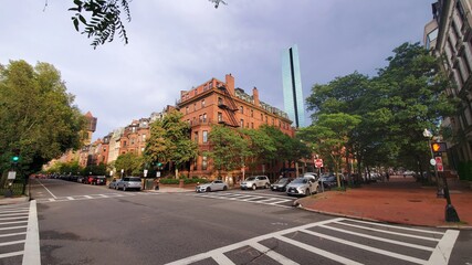 Fototapeta premium street in an old city with red buildings and trees (John Hancock Tower)