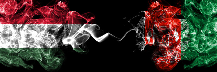 Hungary, Hungarian vs Afghanistan, Afghan smoky flags side by side.