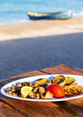 Grilled rapana dish on Black Sea, Vama Veche - Romania