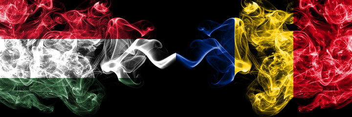 Hungary, Hungarian vs Romania, Romanian smoky flags side by side.