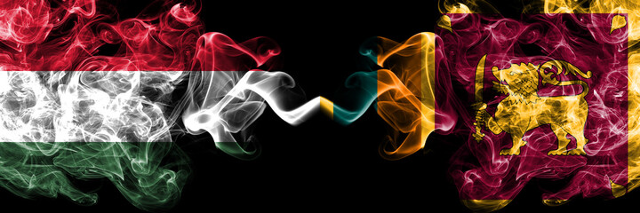 Hungary, Hungarian vs Sri Lanka smoky flags side by side.