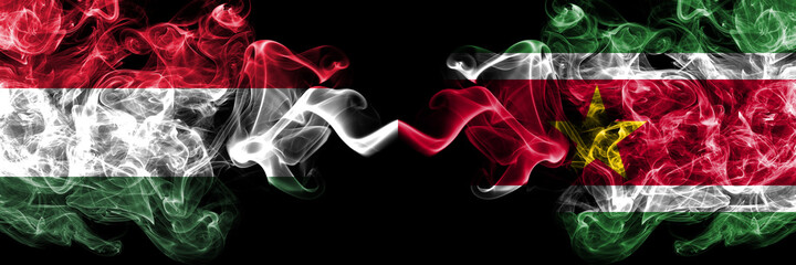 Hungary, Hungarian vs Suriname smoky flags side by side.