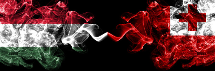 Hungary, Hungarian vs Tonga smoky flags side by side.