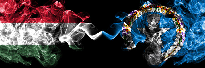 Hungary, Hungarian vs United States of America, America, US, USA, American, Northern Mariana Islands smoky flags side by side.