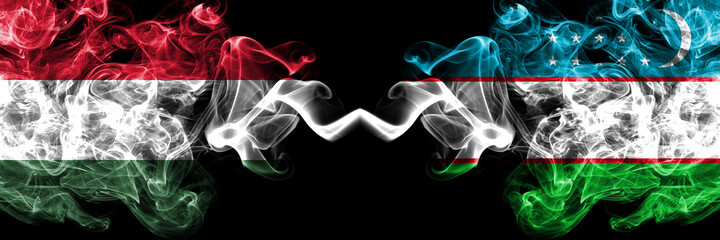 Hungary, Hungarian vs Uzbekistan smoky flags side by side.