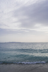 Beautiful landscape of Aegean sea in Athens at cloudy day. Silhouettes of islands in the mist. Nobody. Greece.