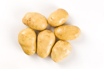 Raw potatoes isolated on white background