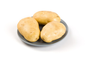 Raw potatoes isolated on white background