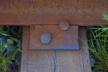 Fototapeta na wymiar Old, abandoned wooden railway sleepers and rails