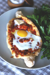 Adjarian khachapuri with egg.