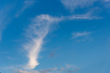 Blue sky background and white clouds soft focus with empty space