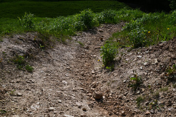 Gravel bike track down the hillside.