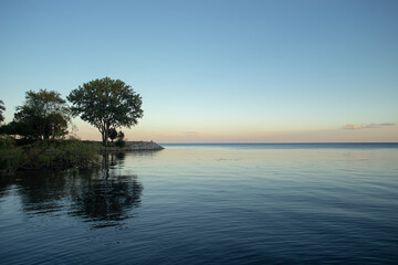 Fototapeta premium Quiet lake at sunset time
