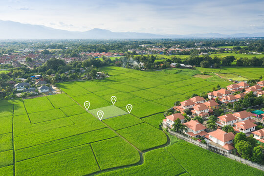 Land plot in aerial view. Identify registration symbol of vacant area for map. That property, real estate for business of home, house or residential i.e. construction, development, sale, rent and buy.