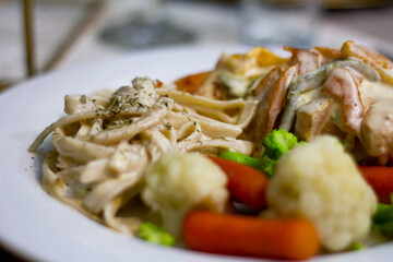 Close up to a fancy dinner plate in a event