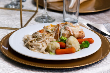 Close up to a fancy dinner plate in a event