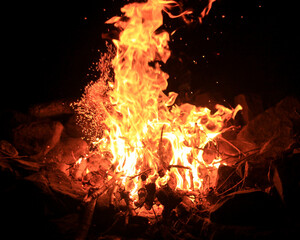 Campfire sparkling at night