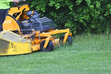 Poster manual worker mowing the lawn © nd700