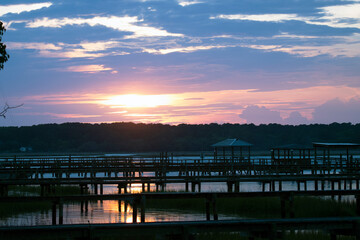 Fototapeta na wymiar Sunset over docks on Southern salt marsh 2