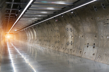 Underground tunnel.Transport walkway by Tunnel Boring Machine for infrastructure subway with raw...