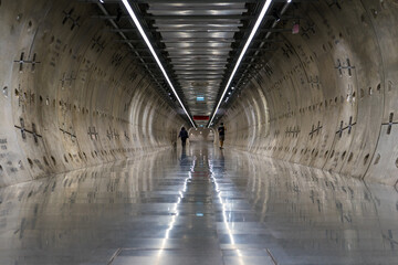 Underground tunnel.Transport walkway by Tunnel Boring Machine for infrastructure subway with raw...