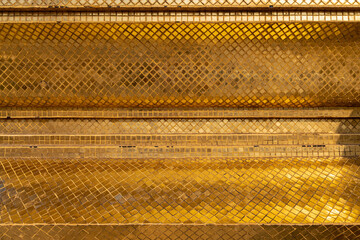 Thai Golden Wall In Temple, Bangkok, Thailand.