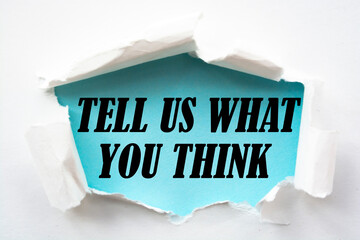 Tell Us What You Think word written under torn paper, business concept