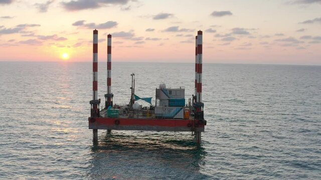 Small Barge in the sea at sunset aerial view
drone view from Netanya, Mediterranean, Israel 2021

