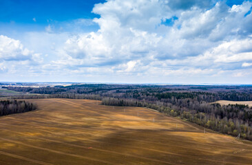Aerial view of agricultural landscape with fields in spring season.