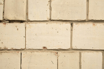 Gentle beige background of brickwork, surface, wall