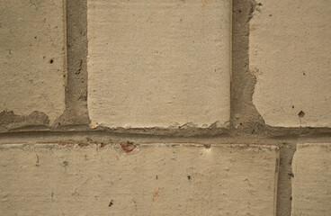 Gentle beige background of brickwork, surface, wall