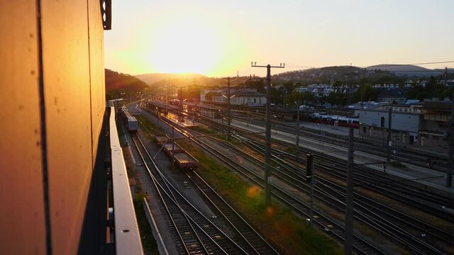 Sunset at Wien Huetteldorf Train Station in Vienna, Austria with Railway Tracks From Above