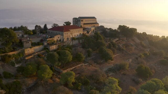 Aerial view over Mount Tavor and Church of the Transfiguration
Drone view from North Israel at sunrise , 2021


