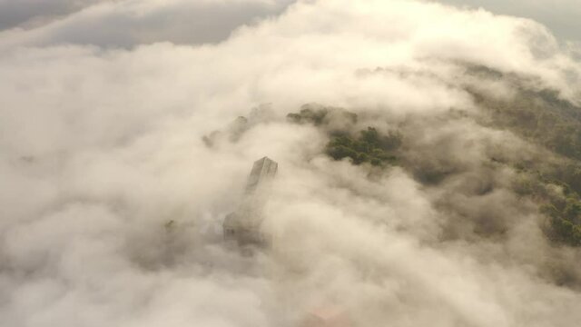 Aerial view over Mount Tavor and Church of the Transfiguration
Drone view from North Israel at sunrise covered with clouds, 2021
