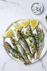 Homemade Grilled Sardines with Garlic, Olive Oil, Fresh Parsley, and Lemon