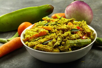 Bowl of homemade delicious Aviyal dish, curry from Kerala cuisine.
