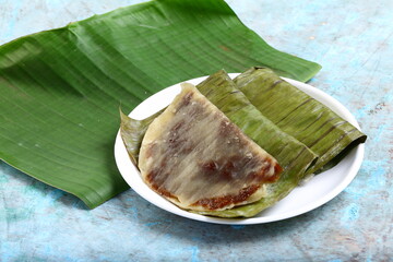 Fresh made steamed foods- Kerala recipes- ilayada or ila ada coconut filled with sweets and dry fruits.
