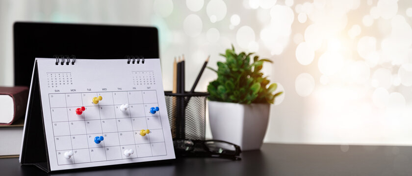 Calendar Event Planner is busy.calendar,clock to set timetable organize schedule,planning for business meeting or travel planning concept.