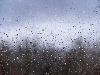 raindrops on window glass, autumn season