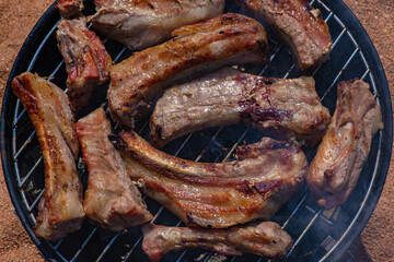 Grilled ribs meat on the nature by the sea 