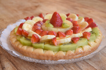 colored tart with assorted fruit