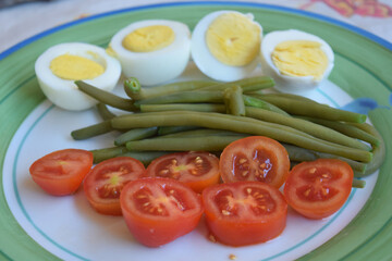 tomatoes, green beans and hard-boiled eggs